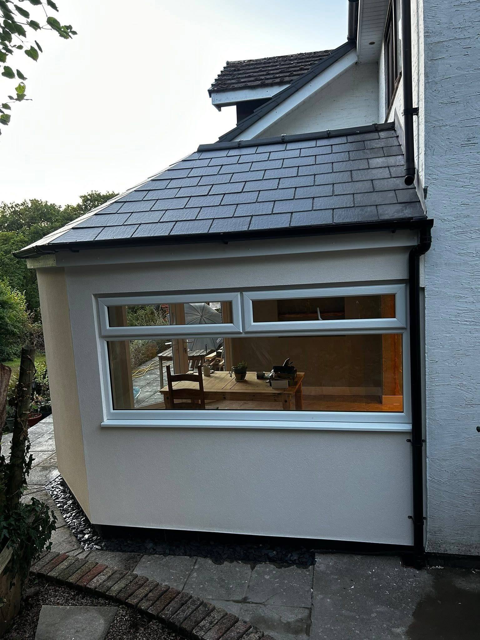 Finished slate-roof conservatory extension exterior